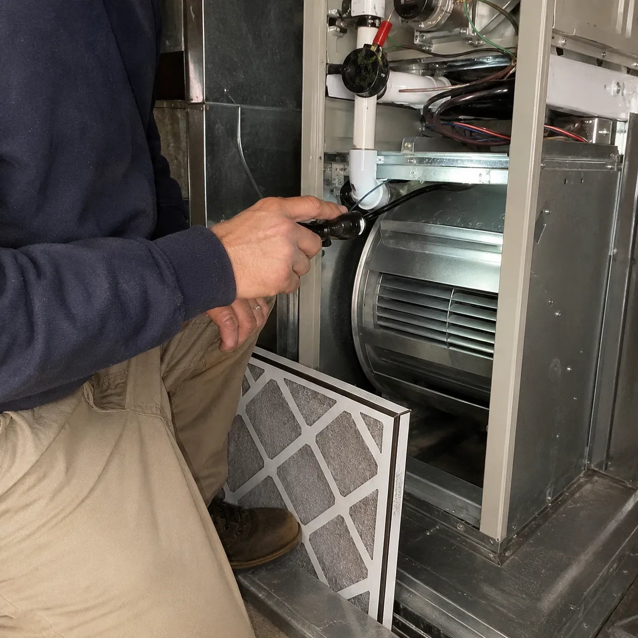 Hvac Technician Checking Indoor Air Quality Equipment