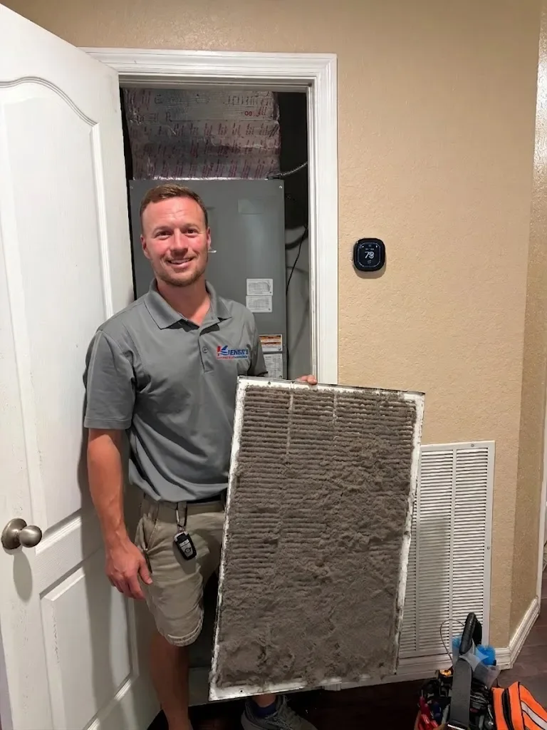 Steve Kiener Holding Dirty Return Air Grille